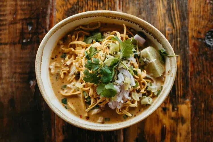 A bowl of khao soi with crispy noodles at Wild Rose Northern Thai Eats in downtown Bend