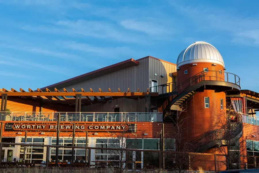 The Worthy Brewing building and its observatory dome on the east side of Bend