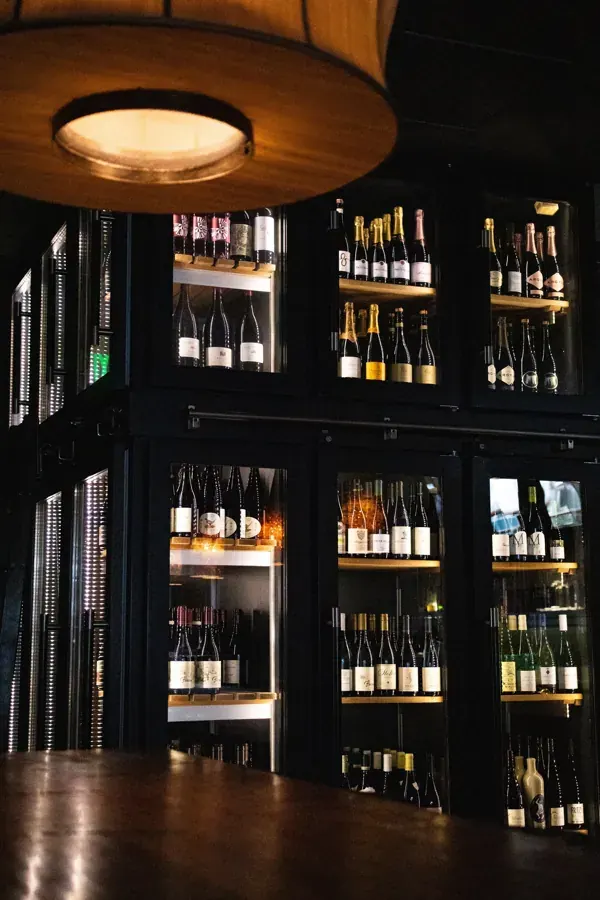 The glass wine room and bar at Zydeco Kitchen & Cocktails in downtown Bend