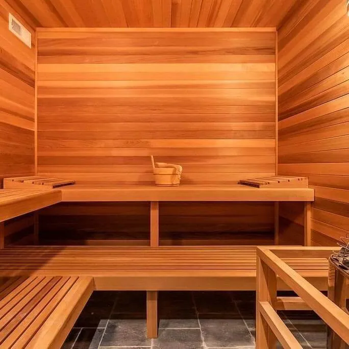 A cedar Finlandia sauna interior with benches