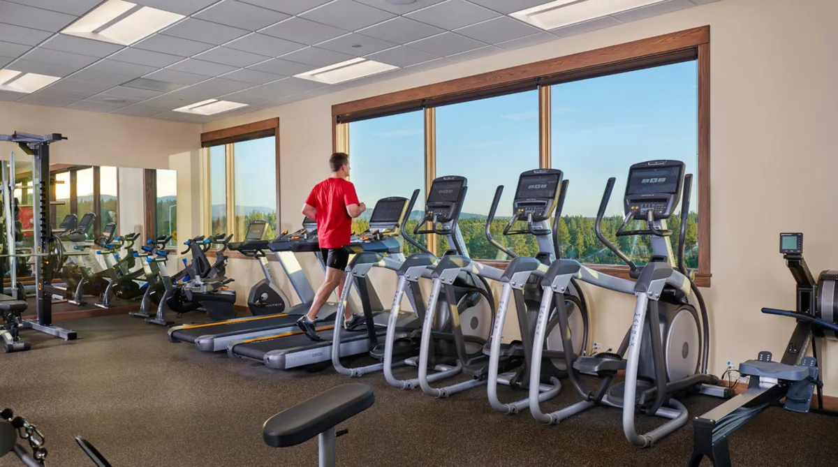The fitness room with mountain views at Tetherow Sport