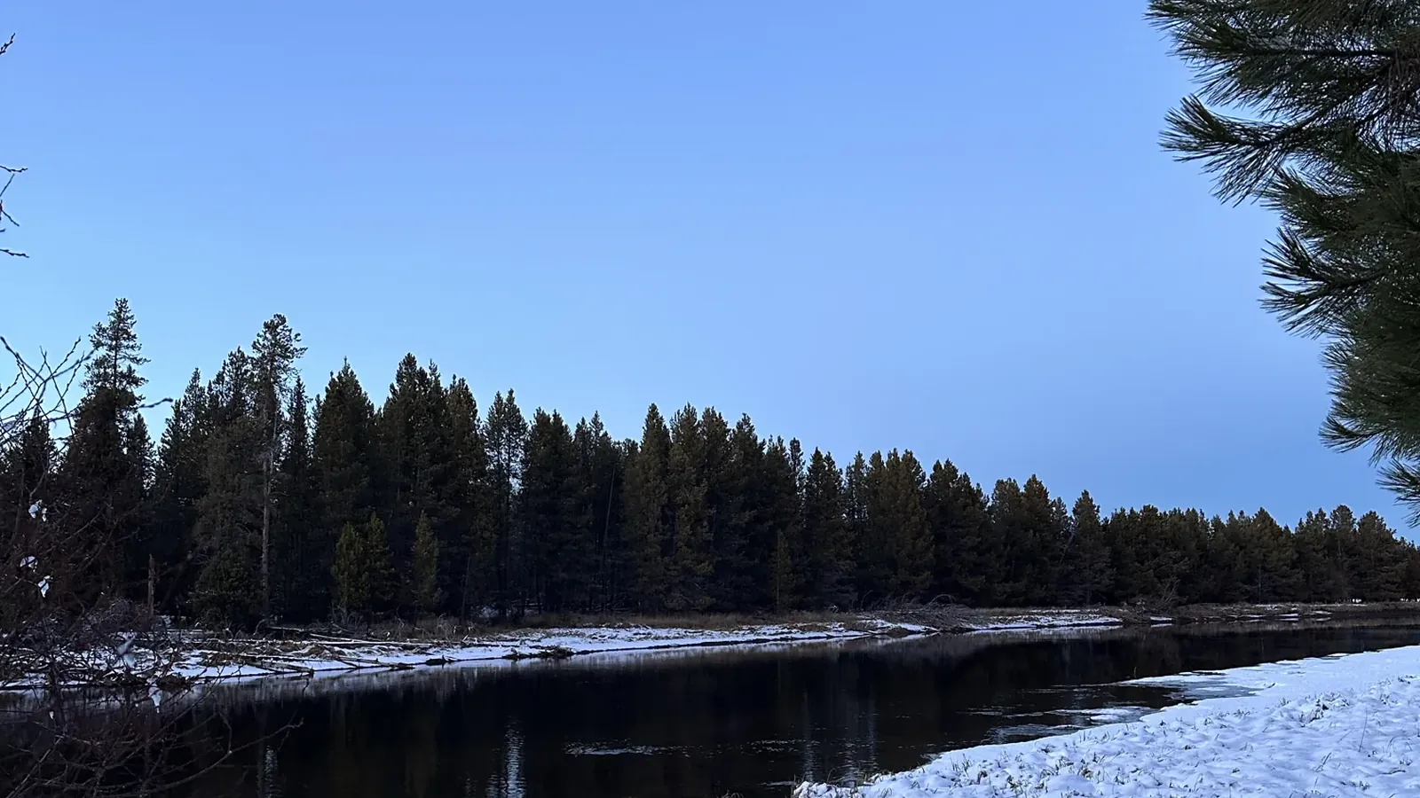 Snow along the Deschutes River on a cold winter morning near Bend, Oregon