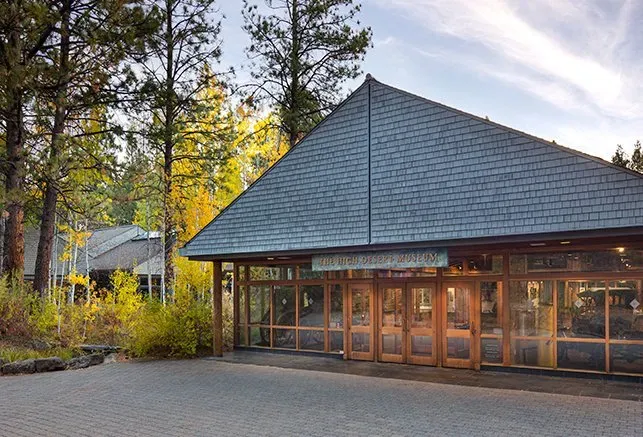 The entrance building of the High Desert Museum among pines